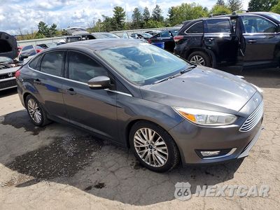 Czwarte zdjęcie samochodu z boku: 2018 FORD FOCUS TITANIUM VIN:1FADP3J25JL314764 - miniatura