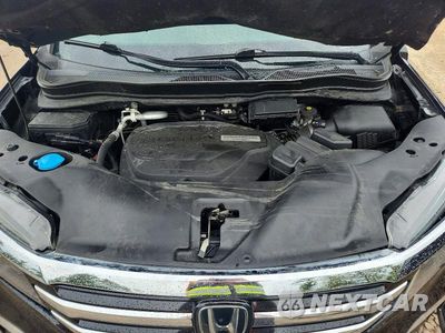 Zdjęcie 12 z 13 samochodu: 2018 HONDA PILOT ELITE VIN:5FNYF6H09JB020825 - miniatura