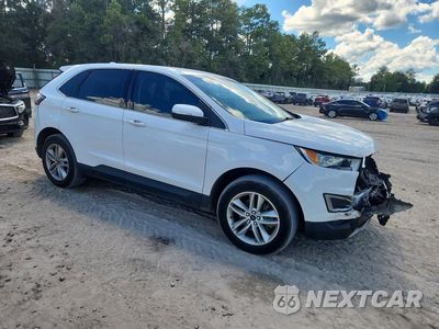 Czwarte zdjęcie samochodu z boku: 2017 FORD EDGE SEL VIN:2FMPK3J8XHBC51628 - miniatura