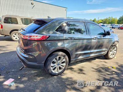 Trzecie zdjęcie samochodu z tyłu: 2019 FORD EDGE TITANIUM VIN:2FMPK4K95KBB62523 - miniatura