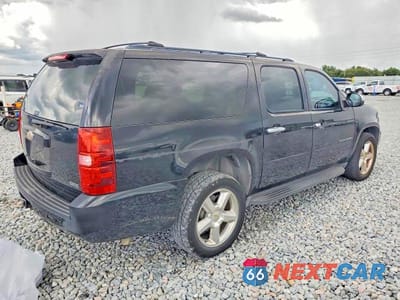 Trzecie zdjęcie samochodu z tyłu: 2011 CHEVROLET SUBURBAN C1500 LT VIN:1GNSCJE07BR317844 - miniatura