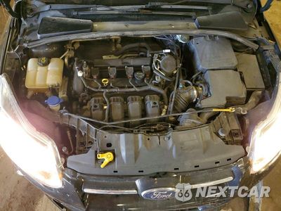 Zdjęcie 11 z 12 samochodu: 2014 FORD FOCUS TITANIUM VIN:1FADP3N22EL258900 - miniatura