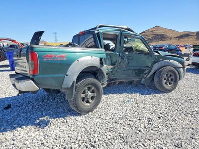 Trzecie zdjęcie samochodu z tyłu: 2001 NISSAN FRONTIER XE VIN:1N6ED27Y21C373992 - miniatura