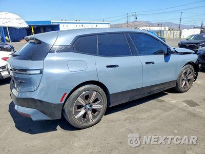 Trzecie zdjęcie samochodu z tyłu: 2024 BMW IX XDRIVE50 VIN:WB523CF02RCP34414 - miniatura