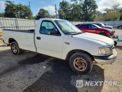 Czwarte zdjęcie samochodu z boku: 2001 FORD F150 VIN:1FTRF17WX1NA21027 - miniatura