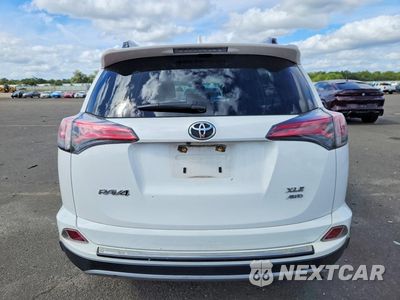 Zdjęcie 6 z 13 samochodu: 2017 TOYOTA RAV4 XLE VIN:JTMRFREV8HJ113649 - miniatura