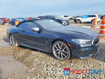 Czwarte zdjęcie samochodu z boku: 2019 BMW M850XI VIN:WBAFY4C59KBX38790 - miniatura