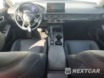 Zdjęcie 8 z 12 samochodu: 2024 HONDA CIVIC TOURING VIN:2HGFE1F9XRH324459 - miniatura