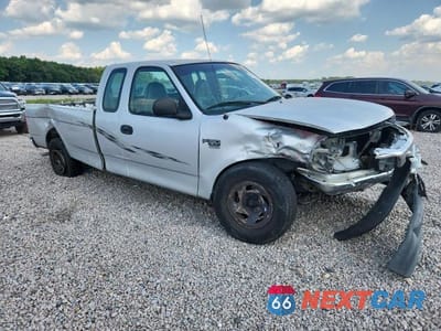 Czwarte zdjęcie samochodu z boku: 1999 FORD F150 VIN:1FTRX17WXXNB69636 - miniatura