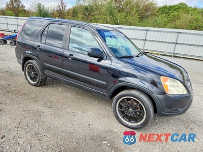 Czwarte zdjęcie samochodu z boku: 2003 HONDA CR-V EX VIN:JHLRD78833C007139 - miniatura