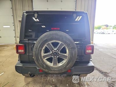 Zdjęcie 6 z 14 samochodu: 2019 JEEP WRANGLER UNLIMITED SAHARA VIN:1C4HJXEN6KW624656 - miniatura