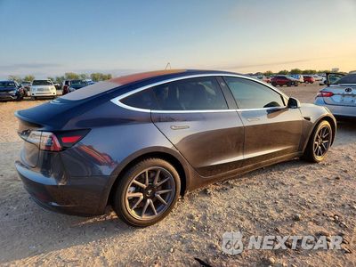 Trzecie zdjęcie samochodu z tyłu: 2018 TESLA MODEL 3 VIN:5YJ3E1EA9JF031580 - miniatura