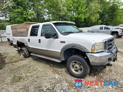Czwarte zdjęcie samochodu z boku: 2004 FORD F250 SUPER DUTY VIN:1FTNW21L04EA41987 - miniatura