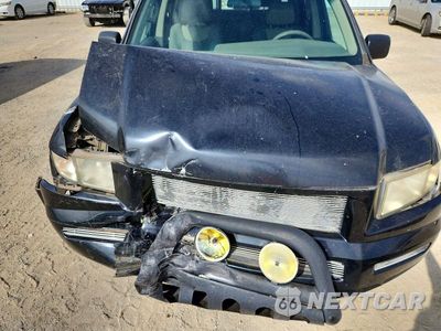 Zdjęcie 11 z 12 samochodu: 2006 HONDA RIDGELINE RT VIN:2HJYK16246H529544 - miniatura