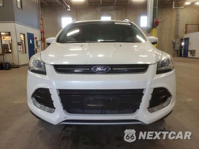 Piąte zdjęcie samochodu w środku: 2014 FORD ESCAPE TITANIUM VIN:1FMCU9J91EUE52909 - miniatura
