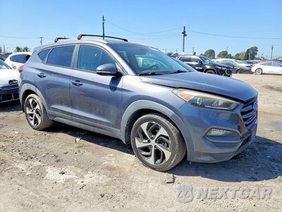 Czwarte zdjęcie samochodu z boku: 2016 HYUNDAI TUCSON SPORT VIN:KM8J33A22GU120877 - miniatura