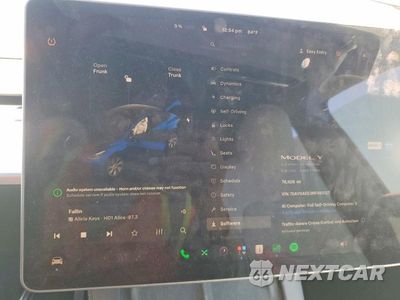 Zdjęcie 9 z 14 samochodu: 2022 TESLA MODEL Y VIN:7SAYGAEE3NF493127 - miniatura