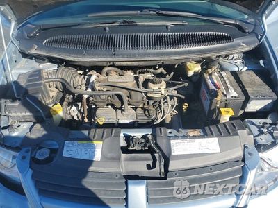 Zdjęcie 12 z 13 samochodu: 2006 DODGE GRAND CARAVAN SXT VIN:2D4GP44L06R857264 - miniatura