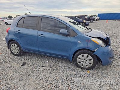 Czwarte zdjęcie samochodu z boku: 2009 TOYOTA YARIS BASE VIN:JTDKT903X95249100 - miniatura