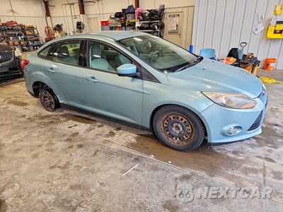 Czwarte zdjęcie samochodu z boku: 2012 FORD FOCUS SE VIN:1FAHP3F22CL232052 - miniatura