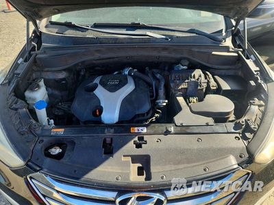 Zdjęcie 12 z 13 samochodu: 2013 HYUNDAI SANTA FE SPORT 2.0T VIN:5XYZW3LA1DG010712 - miniatura