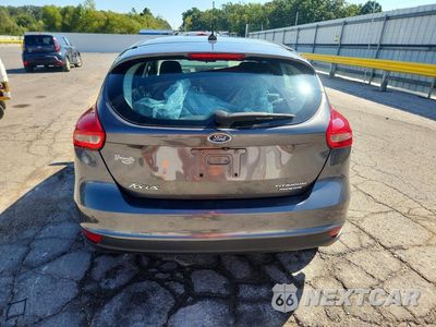 Zdjęcie 6 z 14 samochodu: 2016 FORD FOCUS TITANIUM VIN:1FADP3N27GL253226 - miniatura