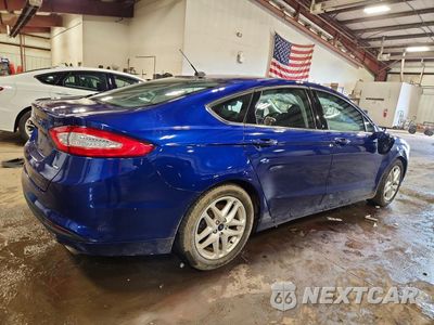 Trzecie zdjęcie samochodu z tyłu: 2016 FORD FUSION SE VIN:3FA6P0H73GR386470 - miniatura