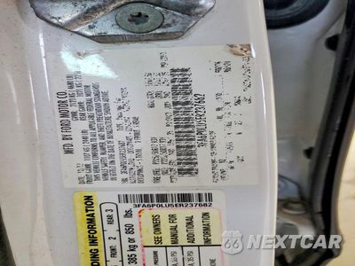 Zdjęcie 12 z 12 samochodu: 2014 FORD FUSION SE HYBRID VIN:3FA6P0LU5ER237682 - miniatura