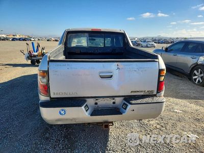 Zdjęcie 6 z 12 samochodu: 2006 HONDA RIDGELINE RTS VIN:2HJYK16426H501033 - miniatura