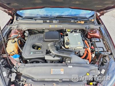 Zdjęcie 11 z 12 samochodu: 2015 FORD FUSION SE HYBRID VIN:3FA6P0LUXFR160406 - miniatura
