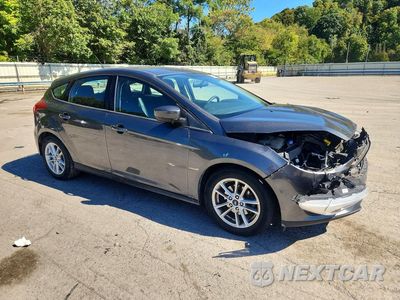 Czwarte zdjęcie samochodu z boku: 2018 FORD FOCUS SE VIN:1FADP3K21JL300133 - miniatura