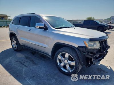 Czwarte zdjęcie samochodu z boku: 2013 JEEP GRAND CHEROKEE OVERLAND VIN:1C4RJECG8DC595940 - miniatura