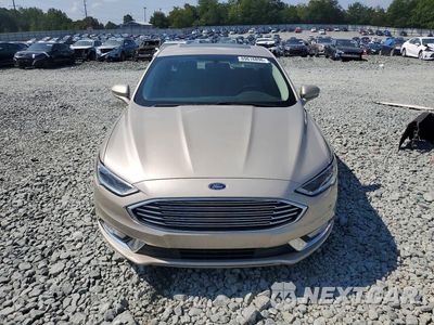 Piąte zdjęcie samochodu w środku: 2017 FORD FUSION SE HYBRID VIN:3FA6P0LU3HR226507 - miniatura