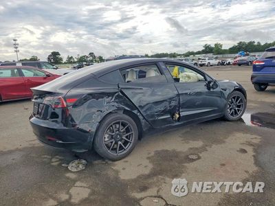 Trzecie zdjęcie samochodu z tyłu: 2023 TESLA MODEL 3 VIN:5YJ3E1EA1PF672392 - miniatura