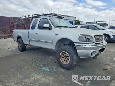 Czwarte zdjęcie samochodu z boku: 1999 FORD F150 VIN:1FTRX17W0XKB74913 - miniatura
