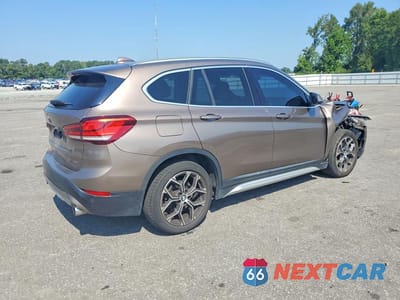Trzecie zdjęcie samochodu z tyłu: 2020 BMW X1 XDRIVE28I VIN:WBXJG9C06L5P15035 - miniatura