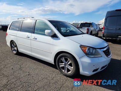 Czwarte zdjęcie samochodu z boku: 2010 HONDA ODYSSEY TOURING VIN:5FNRL3H92AB074736 - miniatura