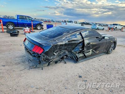 Trzecie zdjęcie samochodu z tyłu: 2015 FORD MUSTANG VIN:1FA6P8AM5F5318607 - miniatura