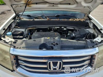 Zdjęcie 12 z 13 samochodu: 2011 HONDA PILOT TOURING VIN:5FNYF4H95BB081237 - miniatura