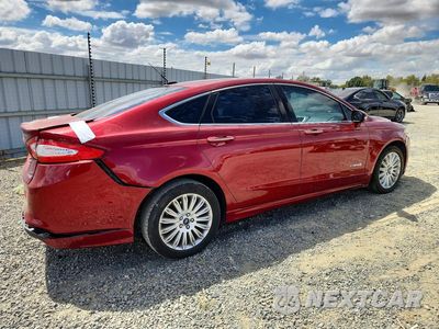 Trzecie zdjęcie samochodu z tyłu: 2014 FORD FUSION SE HYBRID VIN:3FA6P0LUXER195459 - miniatura