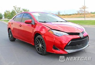 2018 TOYOTA COROLLA LE 5YFBURHE7JP815952 - główne zdjęcie licytacji z USA - miniatura