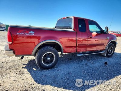 Trzecie zdjęcie samochodu z tyłu: 2002 FORD F150 VIN:1FTRX18L62NB00200 - miniatura