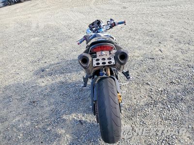Czwarte zdjęcie samochodu z boku: 2011 TRIUMPH MOTORCYCLE STREET TRIPLE R VIN:SMTD02NE8BJ457963 - miniatura