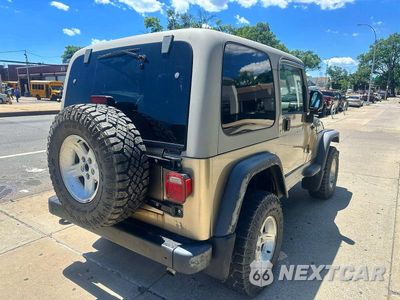 Czwarte zdjęcie samochodu z boku: 2004 JEEP WRANGLER / TJ SPORT VIN:1J4FA49SX4P723705 - miniatura
