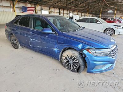 Czwarte zdjęcie samochodu z boku: 2019 VOLKSWAGEN JETTA S VIN:3VWC57BUXKM042048 - miniatura