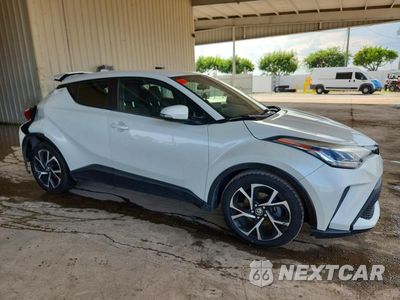 Czwarte zdjęcie samochodu z boku: 2021 TOYOTA C-HR XLE VIN:NMTKHMBXXMR125401 - miniatura