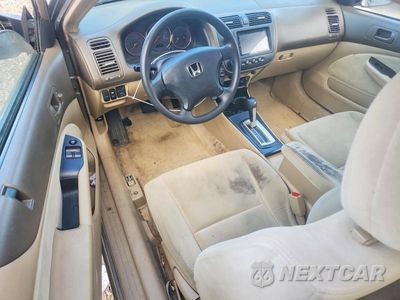 Zdjęcie 8 z 12 samochodu: 2004 HONDA CIVIC LX VIN:1HGEM225X4L009177 - miniatura