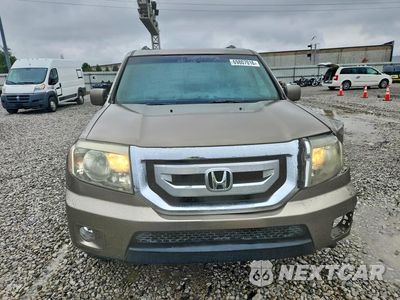 Piąte zdjęcie samochodu w środku: 2011 HONDA PILOT EX VIN:5FNYF3H41BB023513 - miniatura