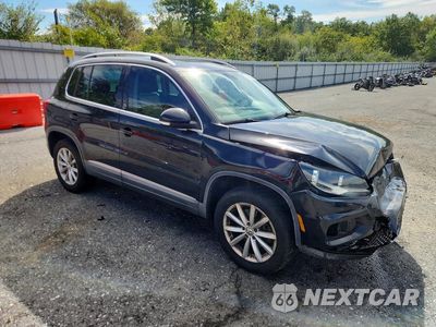Czwarte zdjęcie samochodu z boku: 2017 VOLKSWAGEN TIGUAN WOLFSBURG VIN:WVGRV7AX0HK013145 - miniatura