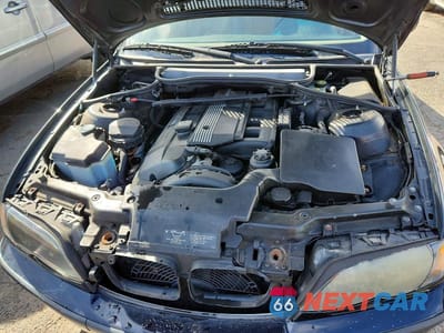 Zdjęcie 11 z 12 samochodu: 2005 BMW 3 SERIES XI VIN:WBAEU33435PR15155 - miniatura